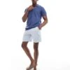 Hollister Closed Stitch Raised Stripe Knit Polo In Mid Blue For Men